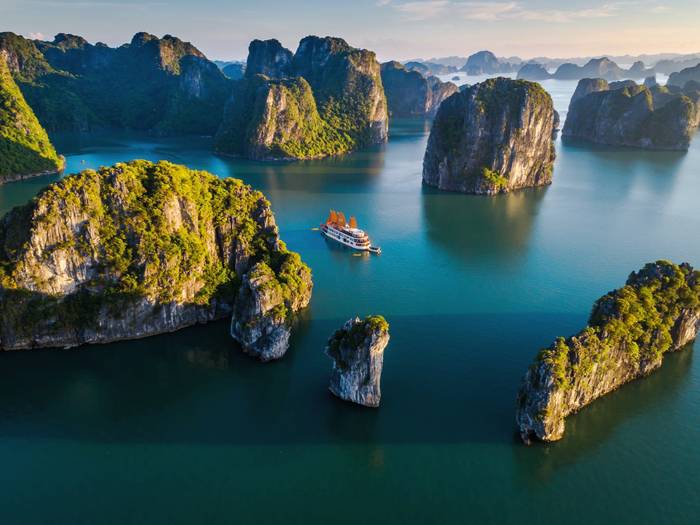 A cruise boat among Ha Long Bay limestone islands